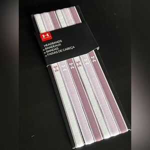 Under Armour headbands in white, purple and pink